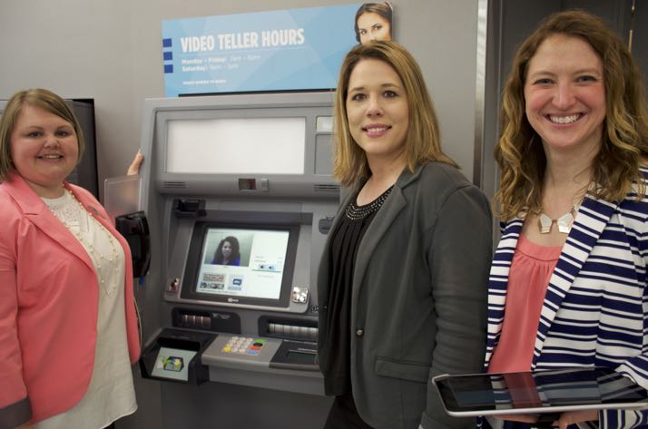 Stephanie Wiley, Kat Hnatyshyn and Amelia Mendus of Community America Credit Union with Siera on the video teller.