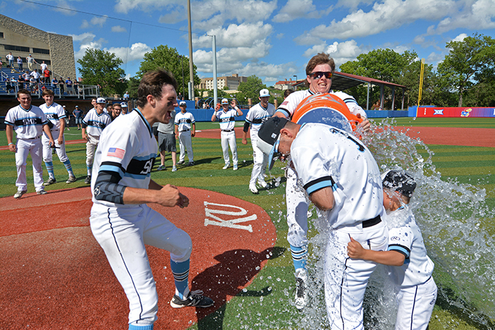Coach Rhyherd is doused in a Gatorade bath by junior Jake Randa after the win. Photo by Joseph Cline