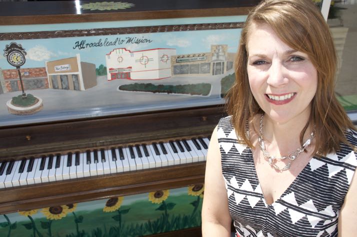 Artist Amy Akin painted the piano that will be in front of Brothers Music on Johnson Drive this summer.