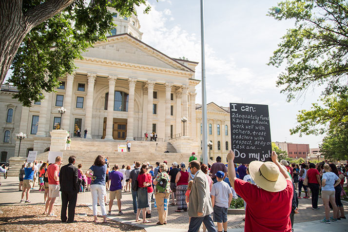 Pro-education funding reform protestors outside the capitol in June.