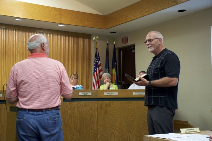 Paul Howe of Deffenbaugh Industries listened to a resident’s complaint Wednesday at the Mission City Council meeting.