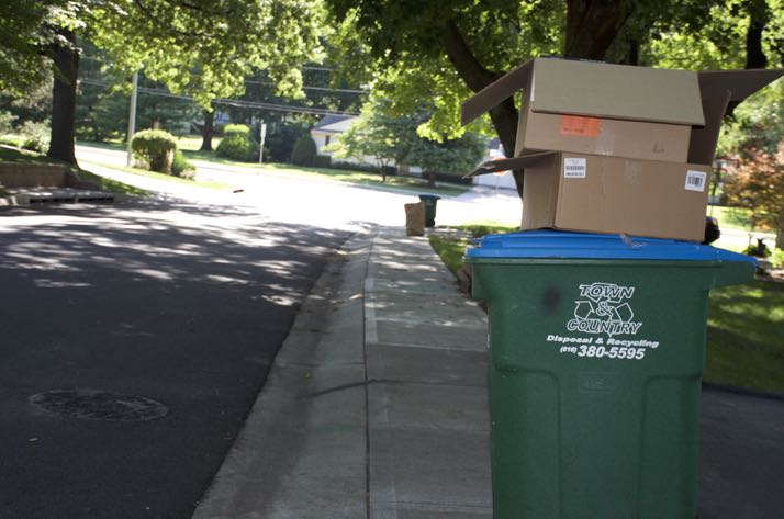 Recycling sat at the curb three days after scheduled pickup this morning.