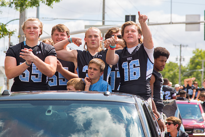 The football teams brought up the back of the parade.
