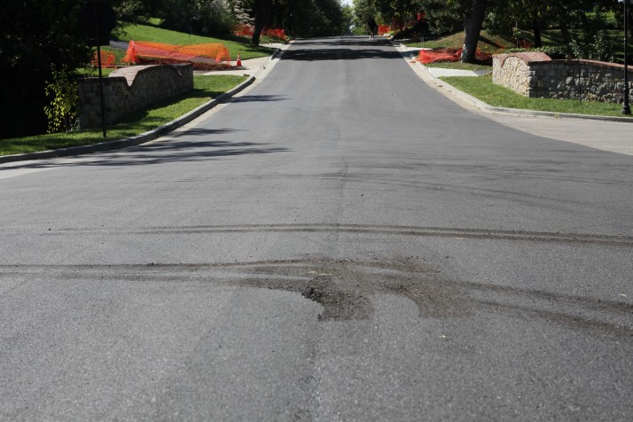 A driver damaged fresh asphalt on 63rd Street in Mission Hills.