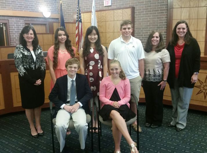 Back row L-R Mayor Laura Wassmer, Zoe Renee Nason - Homeschool, Haoyang "Helen" Sun - Kansas City Christian Schools, Luke Hafner - St. James academy, Councilmembers Jori Nelson and Serena Schermoly; (front) Tyler Ruzich - Shawnee Mission North, Ainsley "Scout" Rice - Shawnee Mission East High School