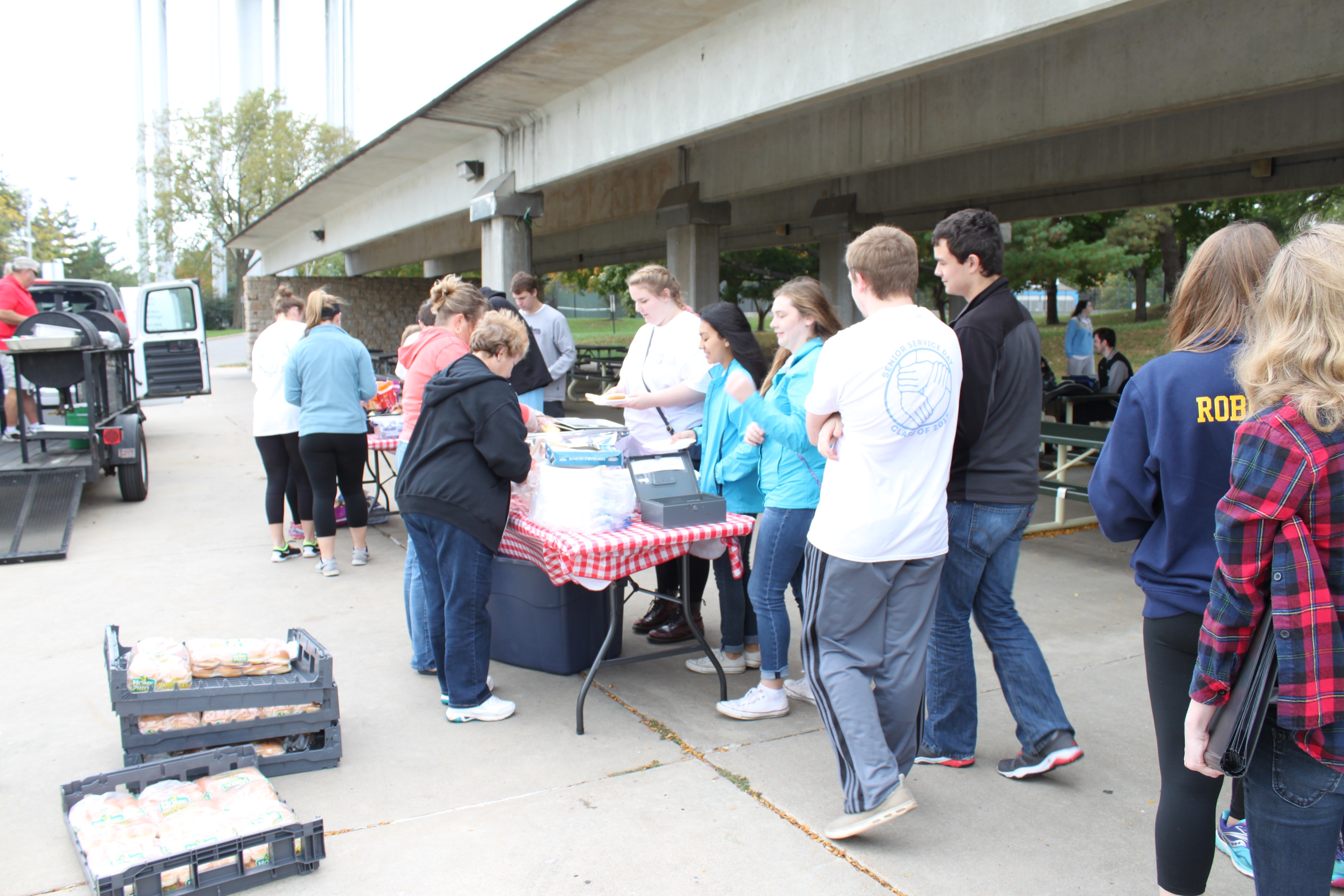 SME seniors returning from the service projects were treated to a picnic lunch at Harmon Park.