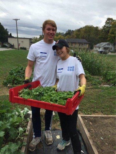 Stanley Morantz and Ellie Booton helped harvest vegetables at Hillcrest Transitional Housing in KCK for their SME Senior Service project.