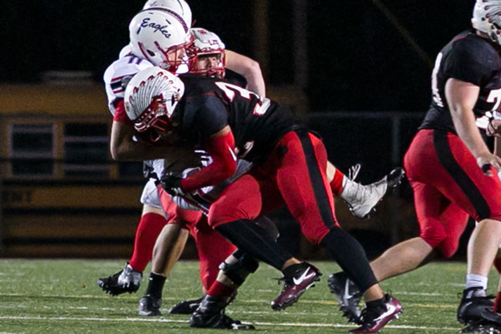 SM North's Reece Sila put pressure on the Olathe North offense all night long.