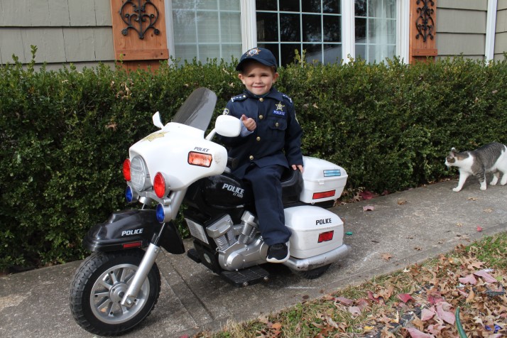 Officer Oliver Davis outside his home in Overland Park.