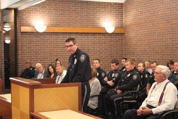 Police Chief Tim Schwartzkopf praises the performance of four of his officers and a dispatcher to the Prairie Village City Council.
