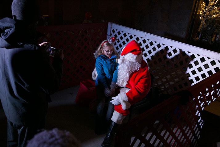 After helping light the tree, Santa fielded gift requests.