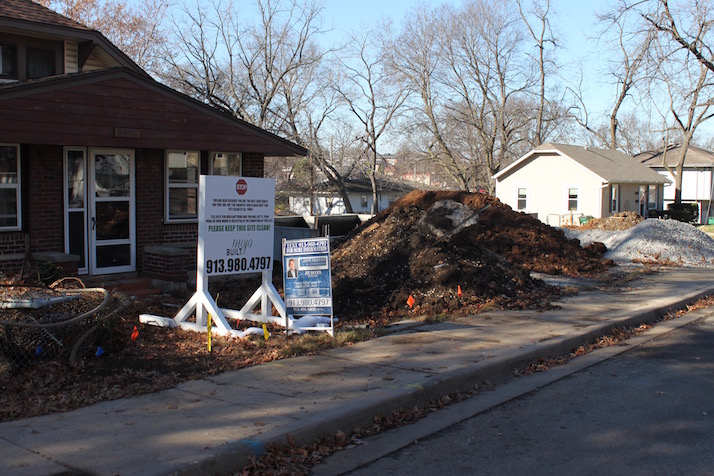 The brick house in the foreground will be torn down soon and replaced with a larger house.