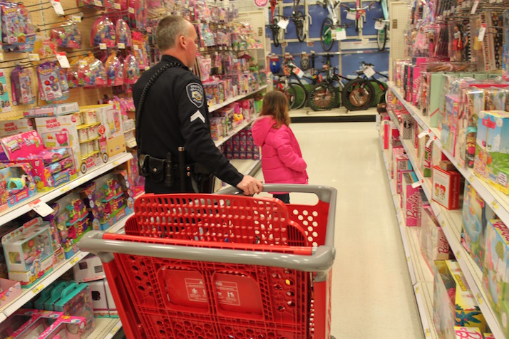 Cpl. Adam Taylor helped his five-year-old narrow her choices.
