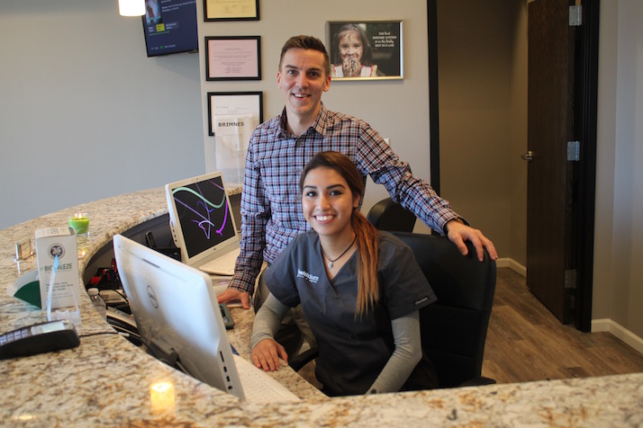 Ryan Nadolski of HealthSource KC with clinic coordinator Ana Martinez.