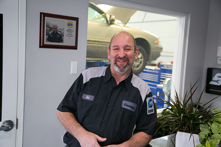 NAPA gave Casey two plaques noting his Technician of the Year award — one for his original location and one for the new location on Johnson Drive.