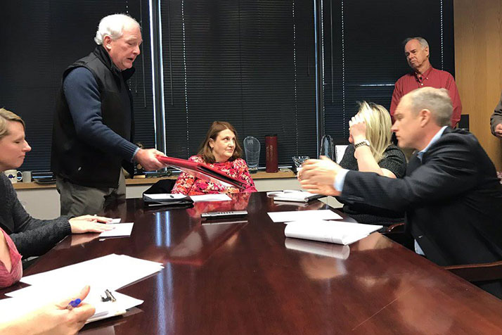Representatives of Indivisible KC delivered the ACA story scrapbooks they compiled to Sen. Pat Roberts' office last week.