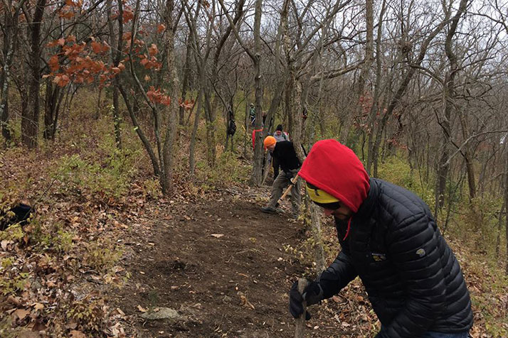 Urban Trail Co. crews at work on the Blue-Swope connector trail in 2014. Photo via Facebook.