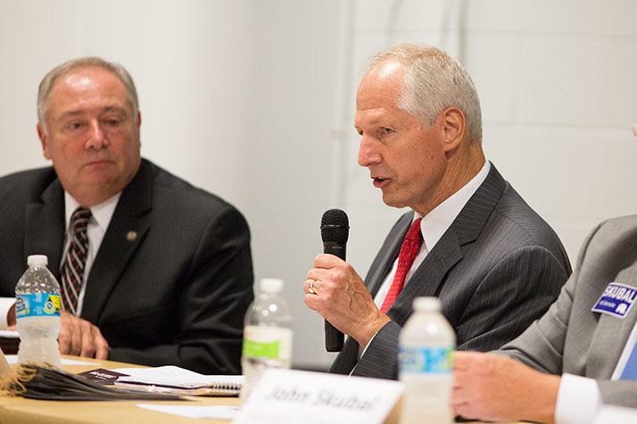 Don McGuire (right) and Jim Denning at a candidate forum last fall.