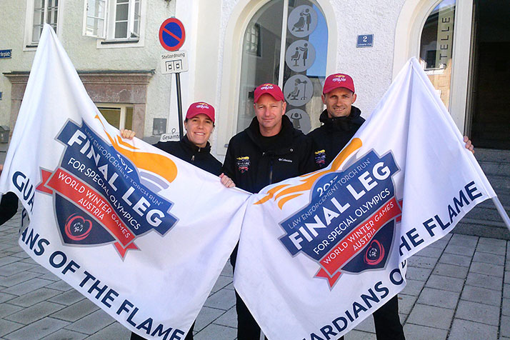 Merriam Police Cpl. James Browning, center, with fellow torch runners Sgt. Cass Cole of Aurora, Colo., (left) and Ales' Suhadolnik of the Slovenian Federal Police (right). Photo courtesy James Browning.