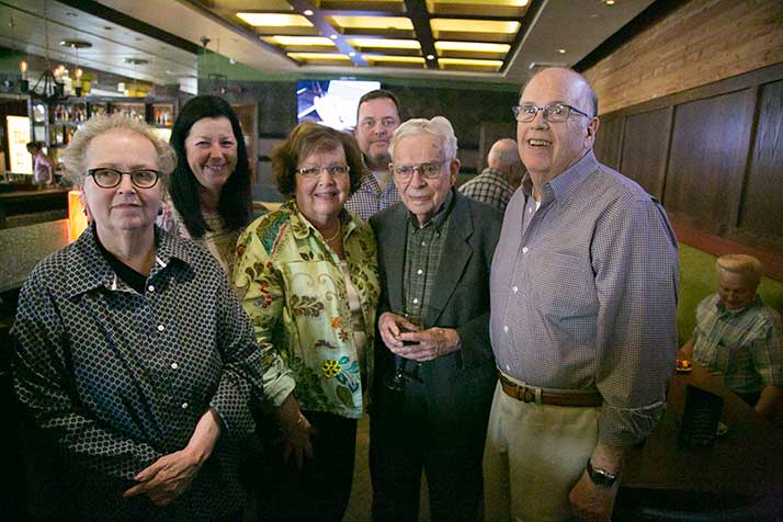 From left, Nancy Henry of Spangler's, Debbie Richmond of Bruce Smith Drugs, Diane Harsh and David Harsh of Tiffany Town, Bill Spangler of Spangler's, and Bob Harsh of Tiffany Town. The Village merchants held a reception at C. Frog's Thursday honoring the longtime Village Shops businesses, which all announced their closure in recent months.