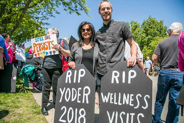 Paffi Flood, left, said she wanted to hold Yoder accountable for voting in favor of a bill she said threatens coverage for millions of Americans.