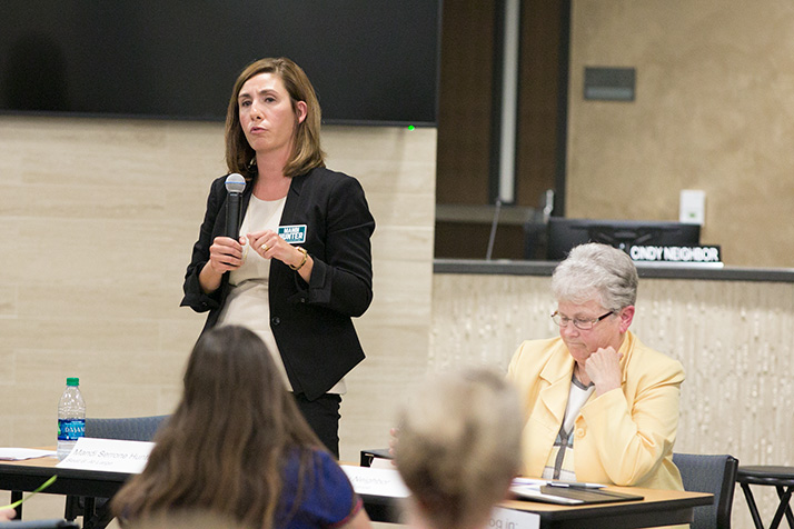 Mandi Hunter (left) said the board needed to do a better job of making district deliberations public so patrons could understand the rationale behind its decisions.