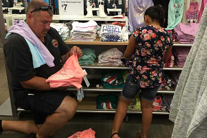 CFD2 firefighters helped a group of Prairie Village kids buy school supplies and clothes. Photo courtesy Ann Lilak.
