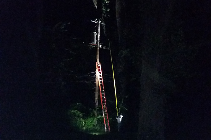 KCP&L crews were back in the neighborhood near Tomahawk Road and Roe Avenue Tuesday to fix another power outage, the sixth in about two months. Photo courtesy Inga Selders.