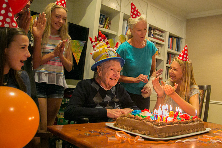 A group of Shawnee Mission East freshmen helped former U.S. Rep. Larry Winn celebrate his 98th birthday at Brighton Gardens Sunday.