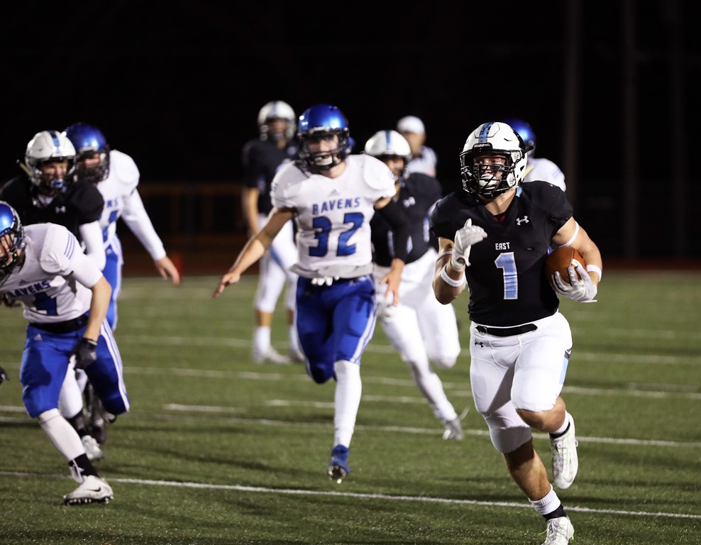 SM East's Milton Braasch ran for 206 yards and 2 touchdowns against the Ravens. All photos by Andrew Poland.
