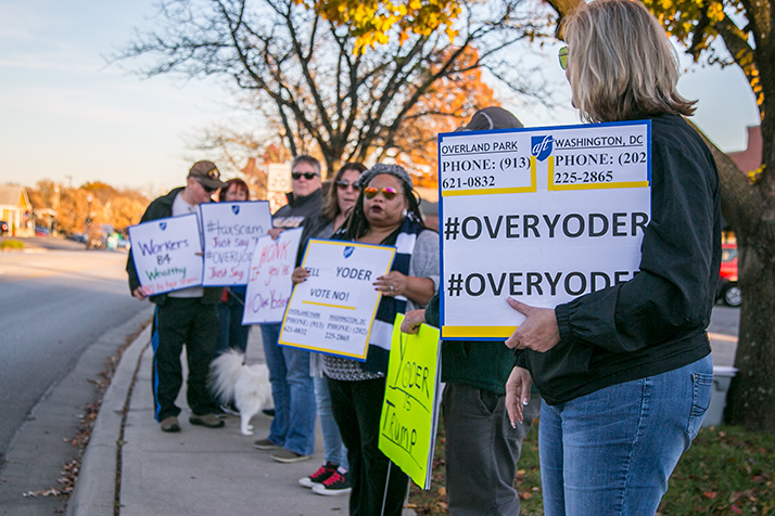 Members of the American Federation of Teachers - Kansas rallied and collected school supplies outside Rep. Kevin Yoder's office Wendesday in a show of opposition to the GOP tax plan.