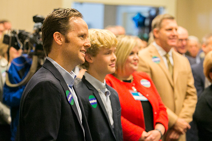 O'Malley and his son listening to opening remarks from Joanna O'Malley at his campaign kick off in Overland Park last month.