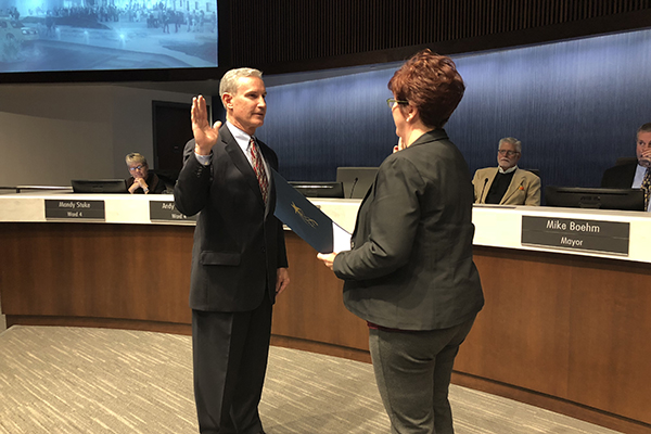 After being appointed by Mayor Michael Boehm, Dan Roh was sworn on to the Lenexa City Council Tuesday. Photo courtesy city of Lenexa.
