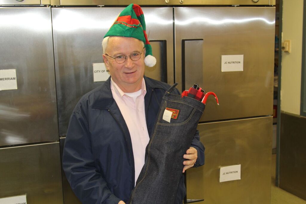 Couty Commissioner Jim Allen was among the crew that delivered stockings to Meals on Wheels clients Wednesday. Photo courtesy Johnson County Government.