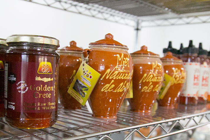 Imported honeys and oils lines the grocery shelves at Oregano & Thyme.