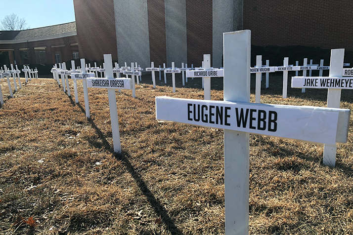 White crosses commemorate the 194 lives lost to violence in the Kansas City area last year.