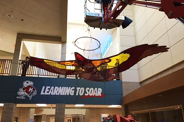 Crews hoisting Learning to Soar into place in the Highlands entry area after Christmas. Submitted photo.