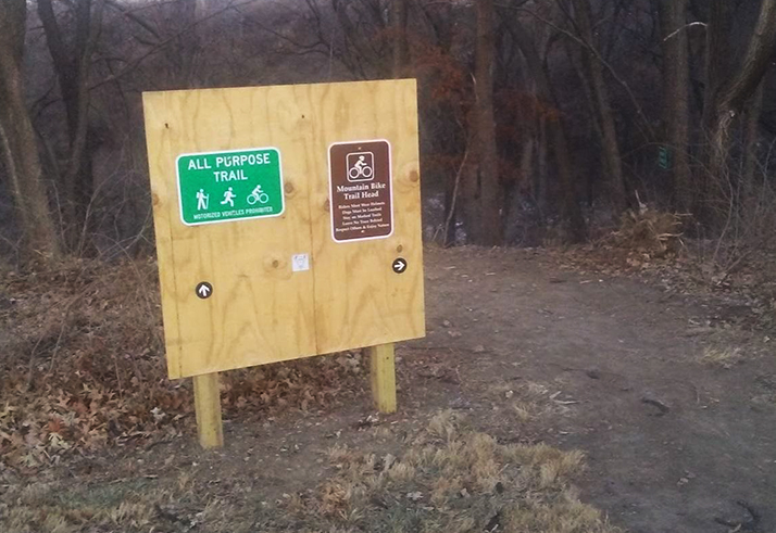 The current signage at the head of the new Nall Park trail.